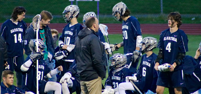 Coach having a chat with players